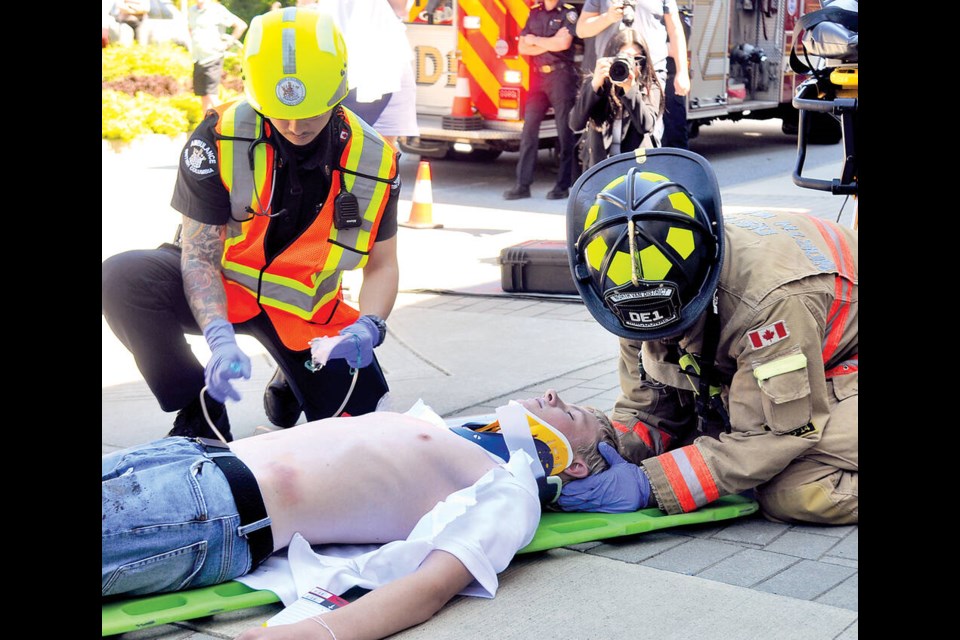 A multi-agency response for a mock crash scenario took place May 10 at North Vancouver’s Argyle Secondary, with student actors playing the part of accident victims. | Paul McGrath / North Shore News 