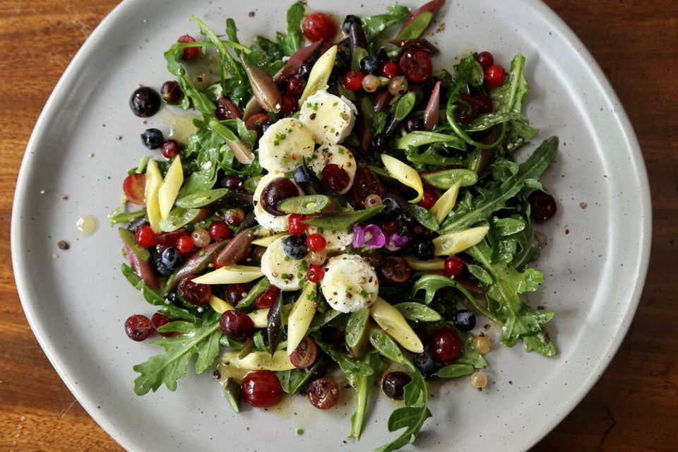 A summer salad made with beans, berries and arugula from the garden. | Laura Marie Neubert 