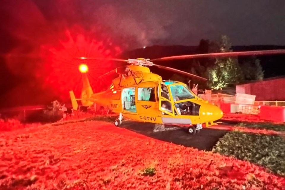 Talon Helicopter’s Dauphin aircraft with night vision and hoist capabilities was dispatched to recover the stranded hikers. | North Shore Rescue 