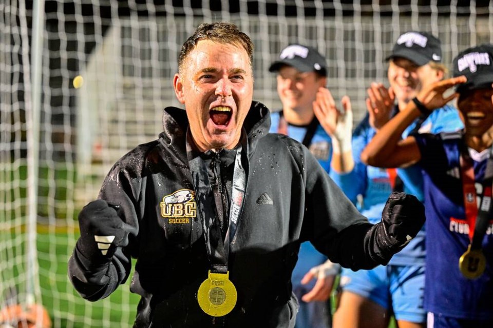 Soaked in Gatorade, UBC women’s soccer coach Jesse Symons celebrates after his team won its second-straight national title. The Thunderbirds beat Laval 1-0 in the finals on Sunday in Halifax, N.S. | Nick Pearce 