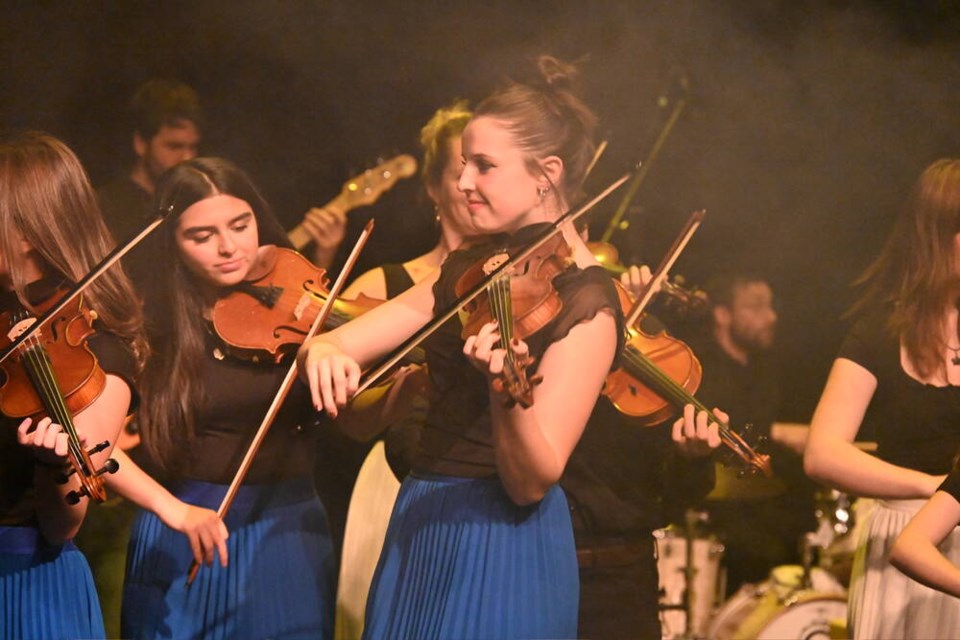 web1_senior-ensemble-on-stage-blue-skirts