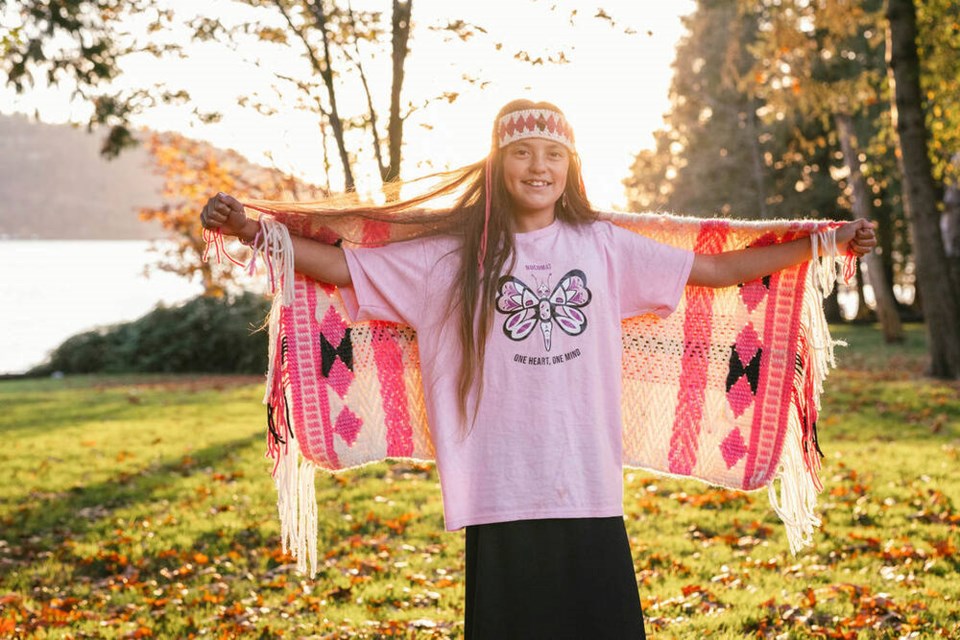 Kadence Lánahmats George is a 13-year-old Indigenous artist from the səlilwətaɬ (Tsleil-Waututh Nation), whose design was selected for this year's national Pink Shirt Day in Canada. | Abbey Stimpson