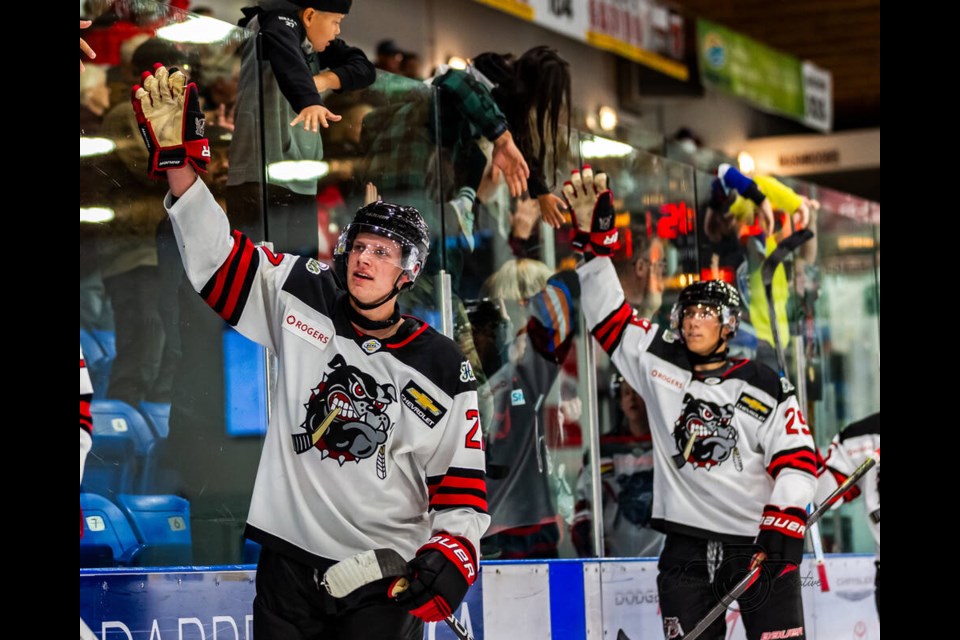 鶹Nation member and Alberni Valley Bulldogs hockey player Wyatt Blace celebrates with the team's fans. Blace is one of six athletes recognized in the Vancouver Island Region of the 2024 Premier's Awards for Indigenous Youth Excellence in Sport. | Courtesy of Chaisson Creative