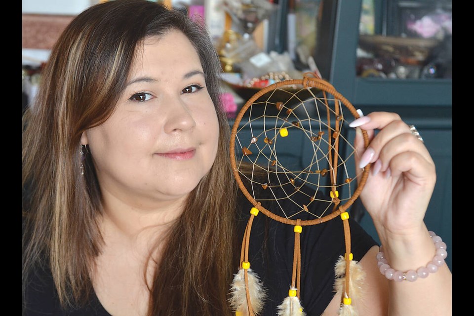 Sade Makerra Auger (Hawk Lace) holds one of her dreamcatchers. | Paul McGrath / North Shore News 