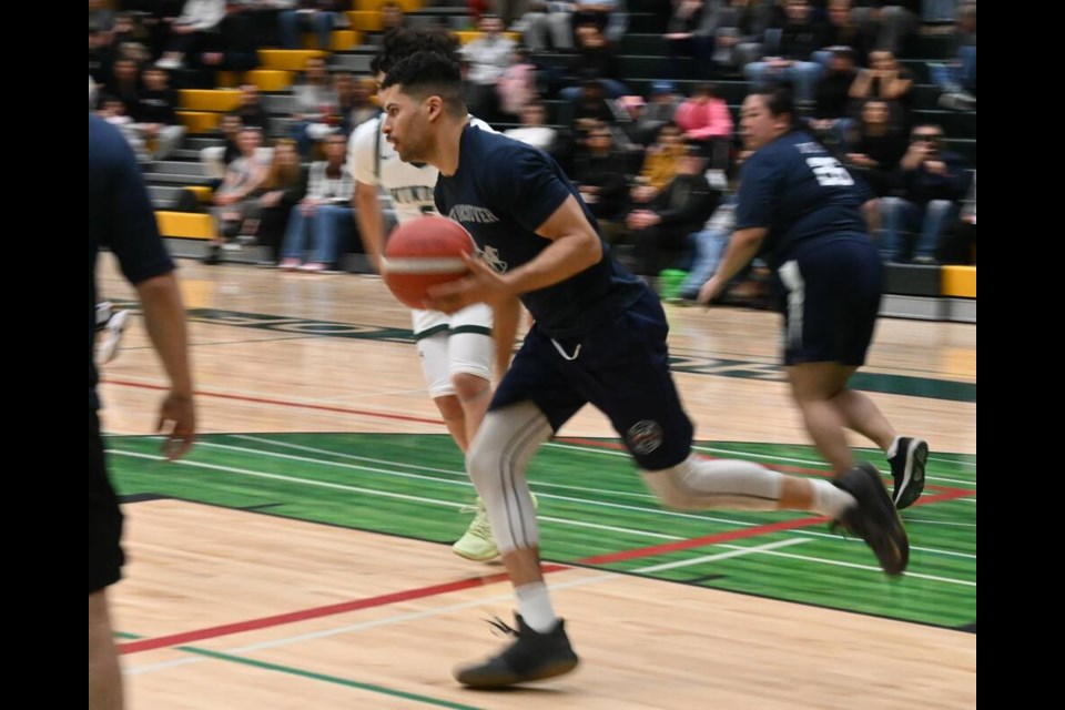 A player on the first responders team hits the court at Windsor Secondary. | Abby Luciano / North Shore News 