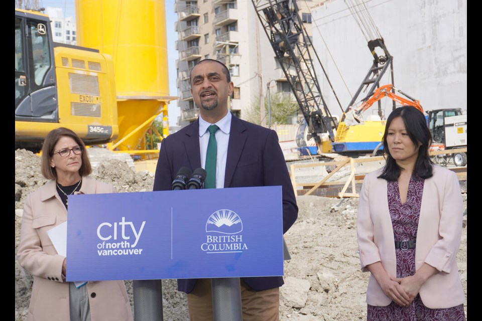 BC Housing Minisiter Ravi Kahlon addresses the media with City of North Vancouver Mayor Linda Buchanan (left) and North Vancouver-Lonsdale NDP MLA Bowinn Ma, at the announcement of construction for North Shore Neighbourhood House, April 4, 2025. | Brent Richter / North Shore News 