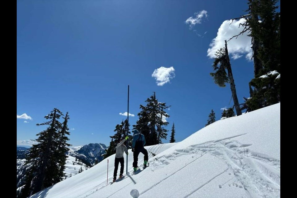 Metro Vancouver staff gather snowpack data at Orchid Lake in April 2024. | Peter Marshall 