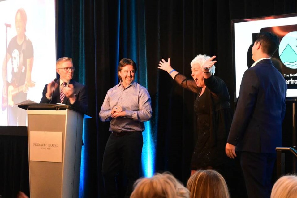 One of the attendees takes home the grand prize of tickets to see Keith Urban in Vancouver later this year. | Abby Luciano / North Shore News 