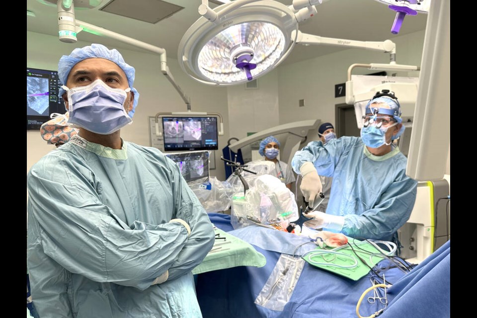 Dr. Shahid Gul, head of neurosurgery at North Vancouver’s Lions Gate Hospital, leads spinal surgery on a patient with the help of a Mazor Robotic Guidance System. | Courtesy of Lions Gate Hospital Foundation. 
