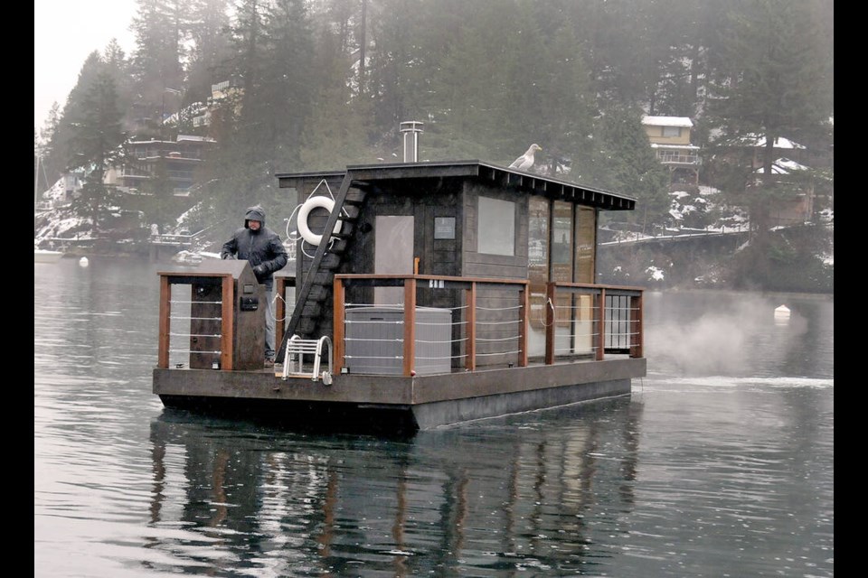 Sisu Swim Sauna entrepreneur Nathan Morris, pictured on board his pontoon-based business in January 2024, has been denied a business licence by the District of North Vancouver. | Paul McGrath / North Shore News 