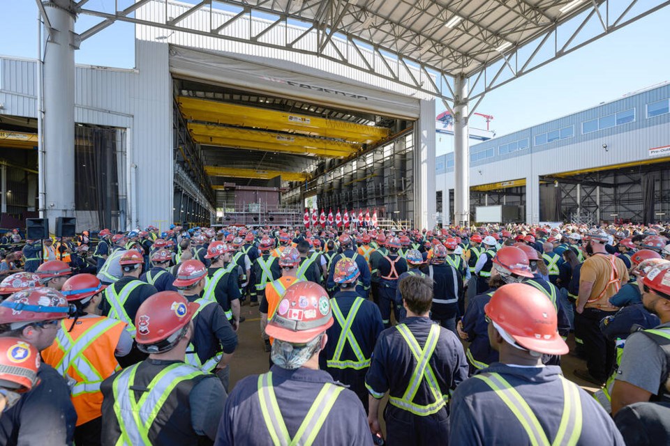 Seaspan workers listen as dignitaries mark the 15th anniversary of the national shipbuilding strategy at the North Vancouver shipyard, Aug. 12, 2025. | Mike Savage / Seaspan. 