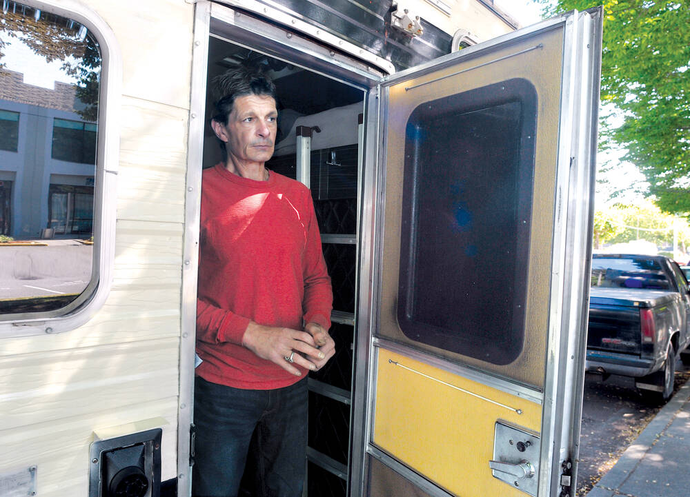Shawn Okell fixed up a broken-down RV and has been living on Third Street near Mackay Creek for the last four months. He is planning to relocate to Vancouver Island. | Paul McGrath / North Shore News