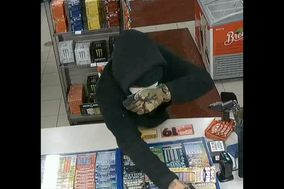 Police seek public assistance identifying the suspect, seen here in surveillance footage, in an armed robbery case from Jan. 4, 2024.