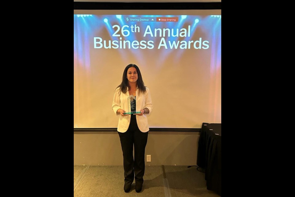 Haley Trimble receiving Business Women of the Year Award (photo courtesy of Haley Trimble) 