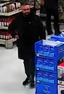 Suspect number 1 is a male with a goatee. His age is approximately 40 years old.  He was wearing a black sweater, green sweatpants, and a long black jacket with black and white running shoes. (Photo submitted by OPP Northwest Region)