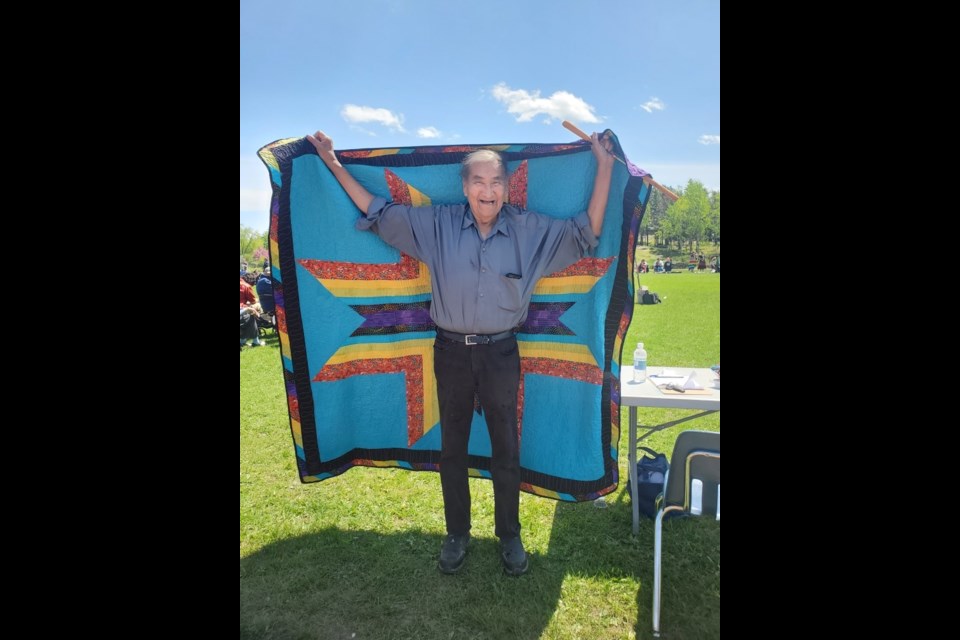 Roy Napish Sr. received a star blanket with Dryden's 2024 Leonard Skye award.