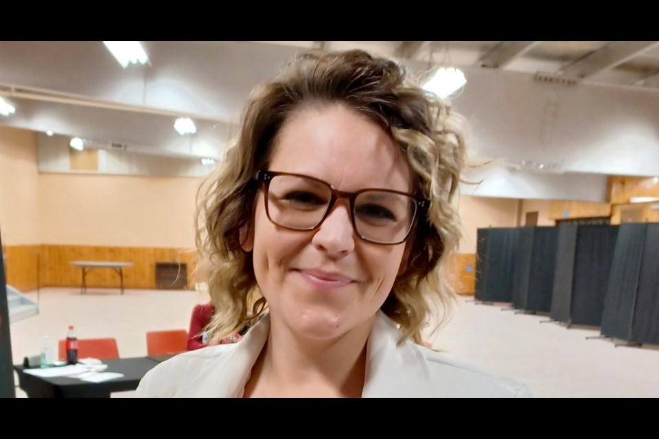 Chela Breckon of With Chela Inc. stands in Ignace's curling hall on April 30, 2024.