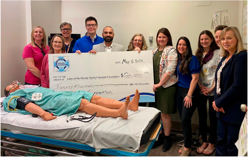 Photo (L to R): Jennifer Young, Trish Tacknyk, Dr. Sean Moore, Brandon Beaulieu, Abhi Thakur, Sheri Lang, 
Nicole Leighton, Amy Houtz, Vanessa Nowe, Mira Trebilcock, and Cheryl O’Flaherty. (photo submitted by LWDHF)