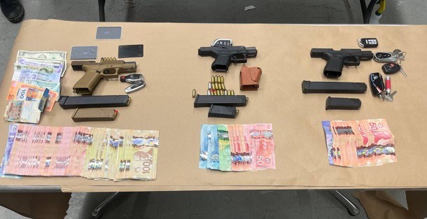 Guns and money seized