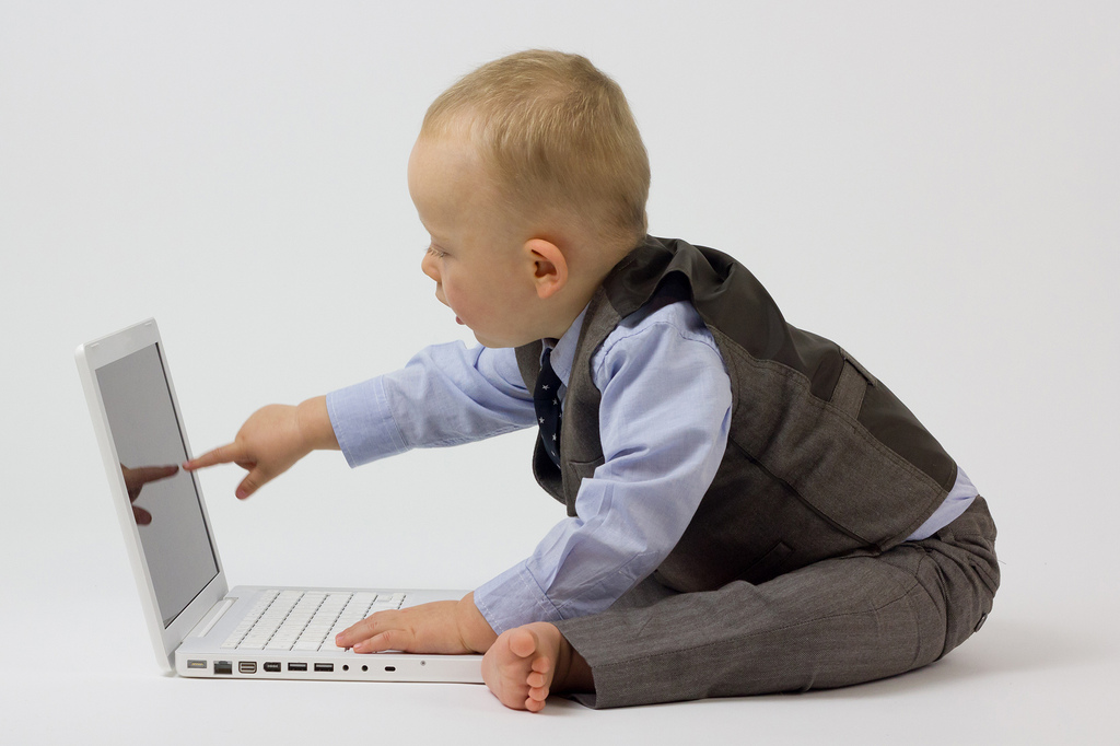 Baby dressed in business suit working on a computer | the UMF via Foter.com  -  CC BY