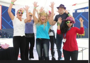 People with there hands in the air - happy |  Top Fundraising Individual: Deborah Gatenby; Photo Credit: United Way Oakville