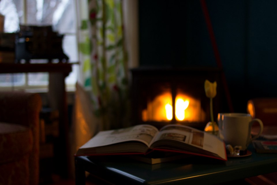 pavan-trikutam-unsplash-book-fireplace-cup