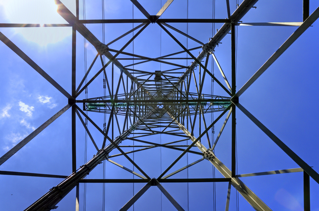 looking up directly under a transmission tower | Photo credit: Bert Kaufmann  -  Foter  -  CC BY