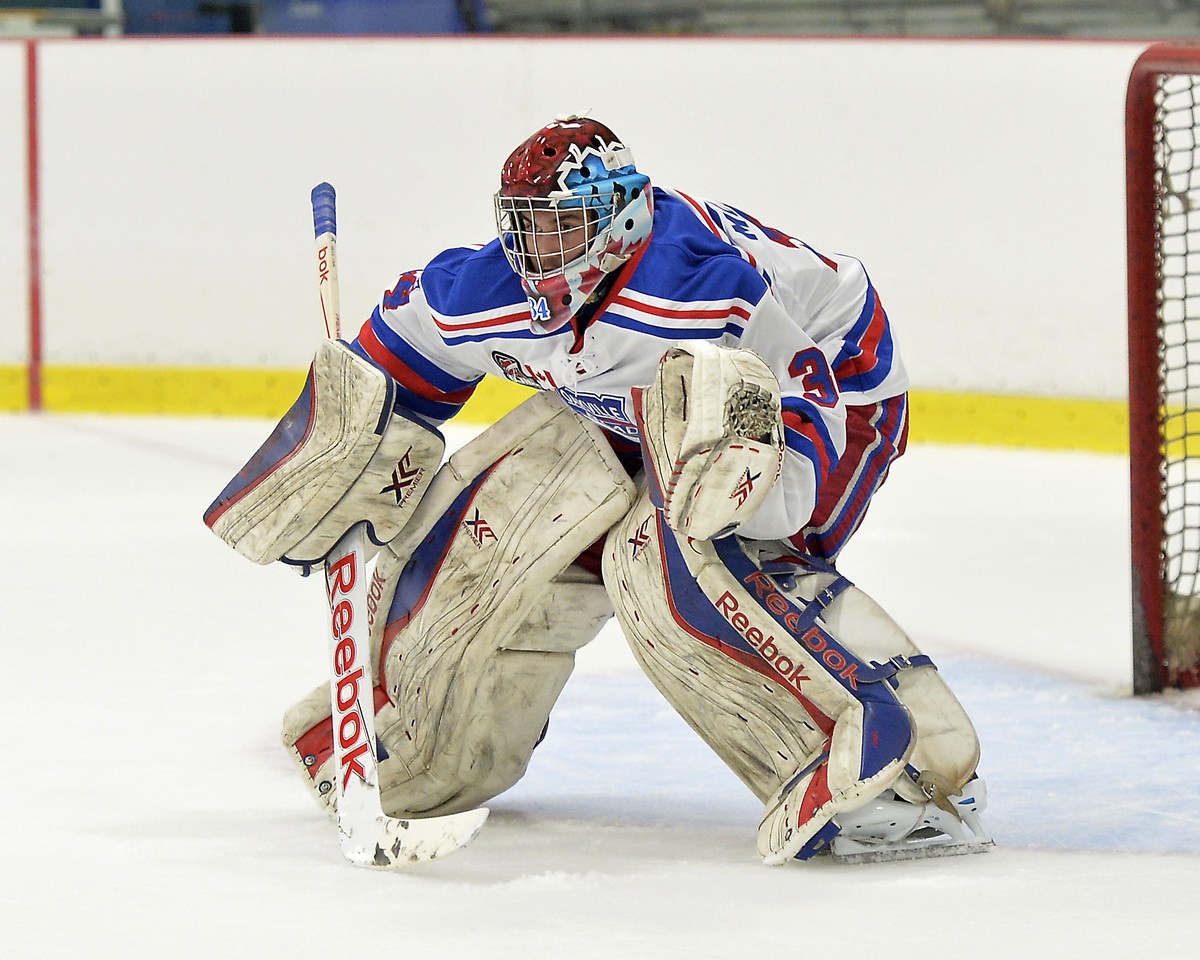 Brendan McGlynn #34 of the Oakville Blades during game action against Georgetown. | Shawn Muir - OJHL Images