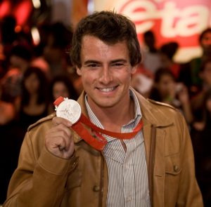 adam van koeverden silver medal |  Adam van Koeverden displaying his silver medal in the K-1 500m from the 2008 Olympics. Image courtesy: Wikimedia Commons