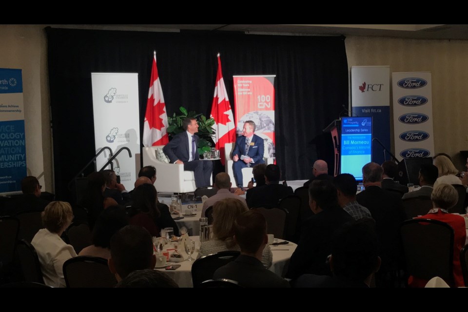 67726138_383967965455818_2115324217082773504_n | Minister Bill Morneau engaging in conversation.
