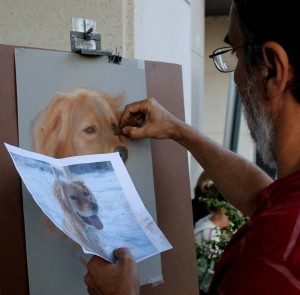 Artist drawing a dog |  Photo Credit: Bronte BIA
