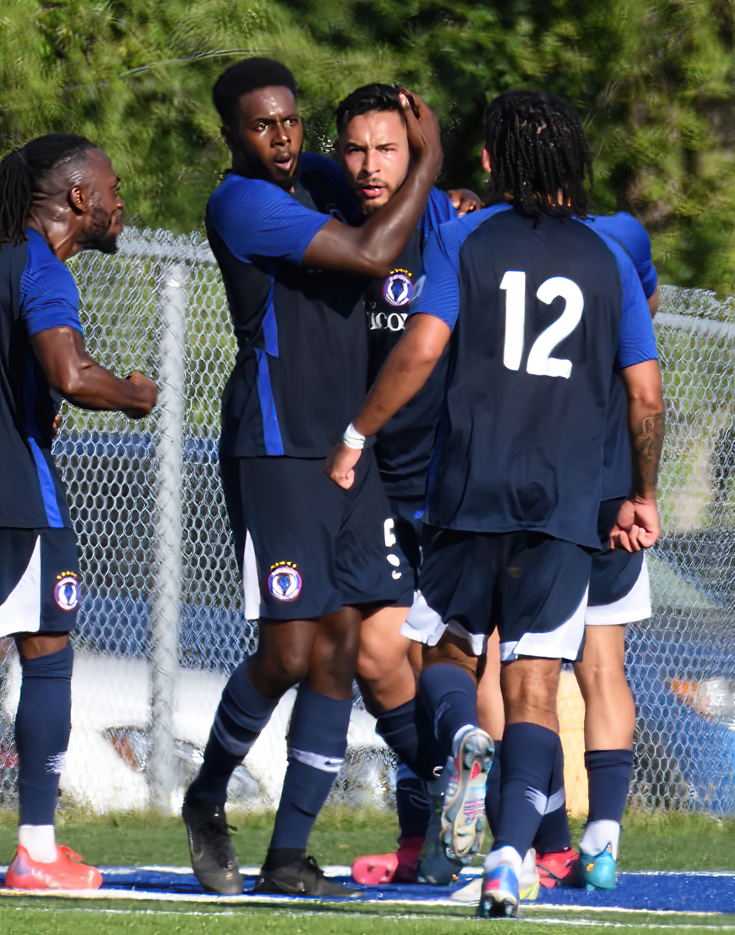 Taha Ilyass, the centre of attention | Taha is virtually unstoppable, last week while draped by two defenders thought the match, he still managed to score the game winner as Blue Devils FC defeated Alliance United in the Semi-Finals. | Bob Twidle