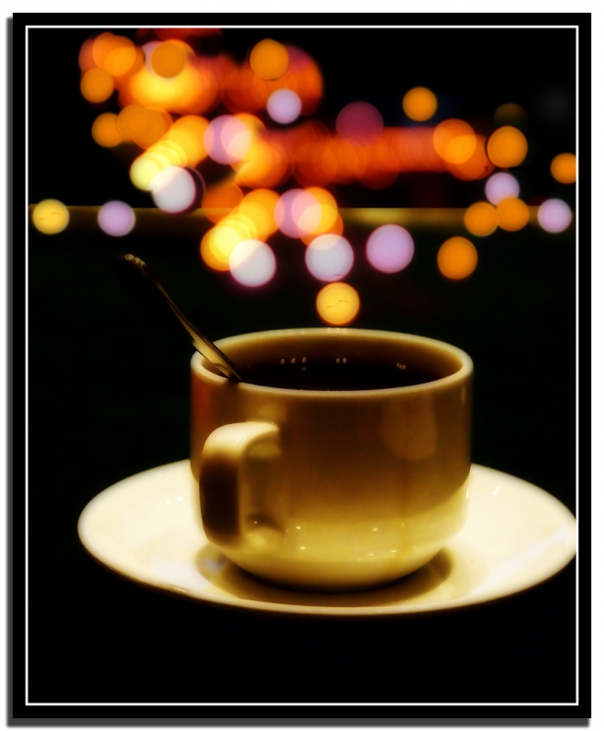 cup of coffee with colour lights in the background | Scholastica Ees says, yuhuuu to all (^_^)  -  Foter.com  -  CC BY-ND