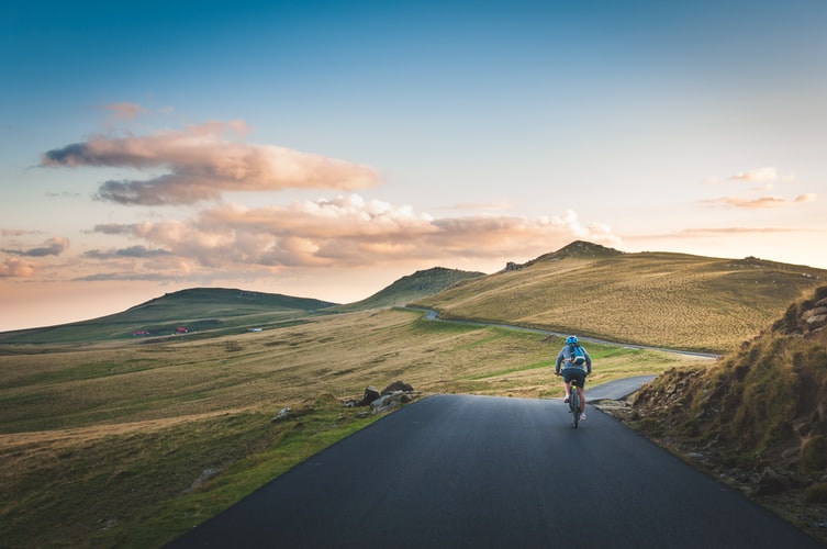 Cyclist Fun | According to Cycling Weekly - Cycling has been linked to several health benefits including improved mental wellbeing, immune system, heart disease and more. | Photo by David Marcu on Unsplash