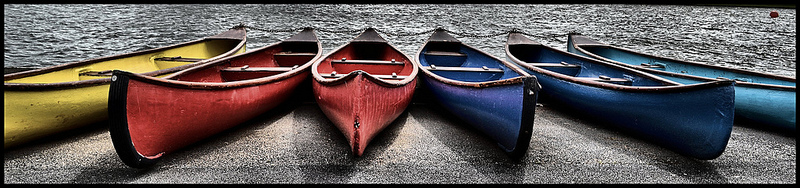 Canoes on a stone beach | CJS*64  -  Foter  -  CC BY-ND