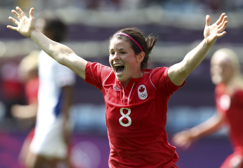 OLY COC London 2012 | Diana Matheson of Canada celebrates her game winner against France in the bronze medal football match in Coventry at the 2012 London Olympics, Thursday, Aug. 9, 2012.  THE CANADIAN PRESS/HO, COC - Mike Ridewood