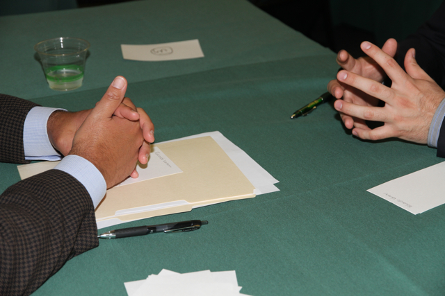 two set of hands on a table facing each other going through an interview | Photo credit: bpsusf  -  Foter  -  Creative Commons Attribution 2.0 Generic (CC BY 2.0)
