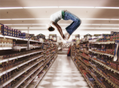 Gymnast doing a flip in a grocery store | Photo credit: David Blackwell.  -  Foter  -  CC BY-ND