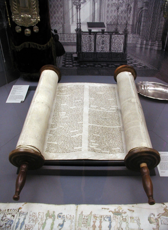 Torah Scrolled on Lectern partially un-rolled