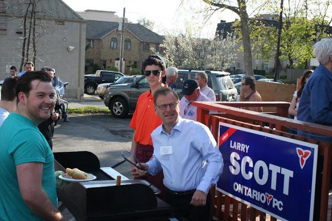Larry Scott serving at his BBQ | Progress Party of Ontario, Oakville Riding 2014