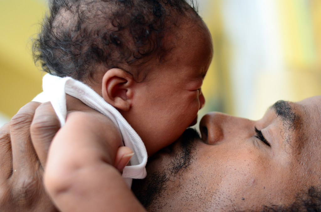 Father kissing his child | cheriejoyful  -  Foter  -  CC BY 2.0