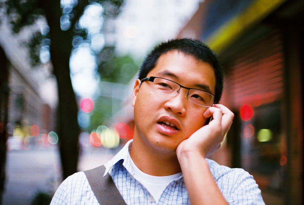 Chinese man answering his cell phone | casschin  -  Foter  -  CC BY