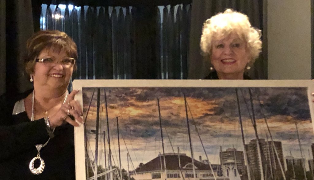 Ann Sargent Tribute - Presentation |  Bronte BIA Chair Cheryl Etherington presented a stunning photograph of Bronte Harbour to Ann. Photo Credit: OakvilleNews.Org