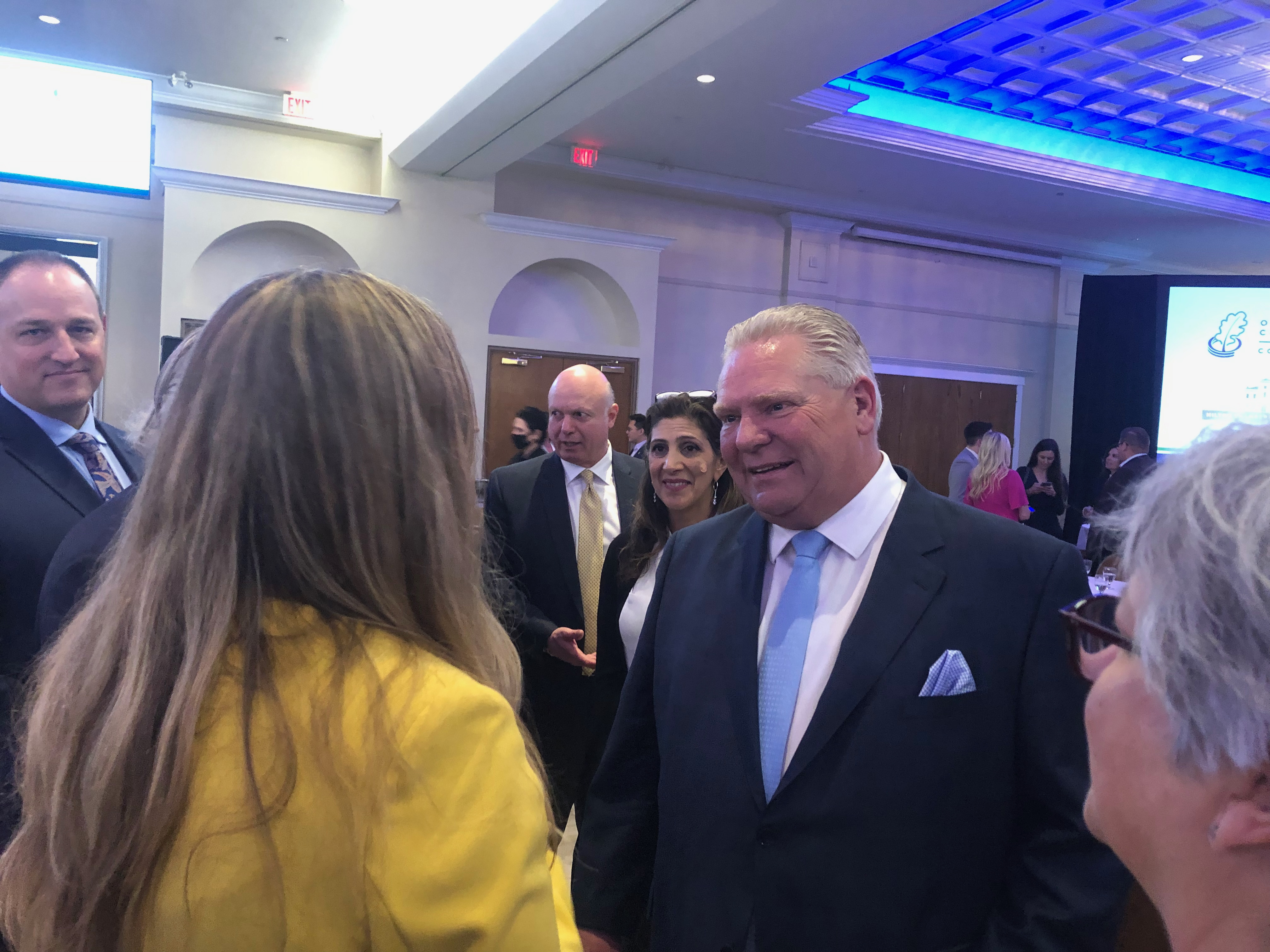 Premier Doug Ford | Doug Ford engages with a constituent at a Chamber of Commerce event | Oakville News