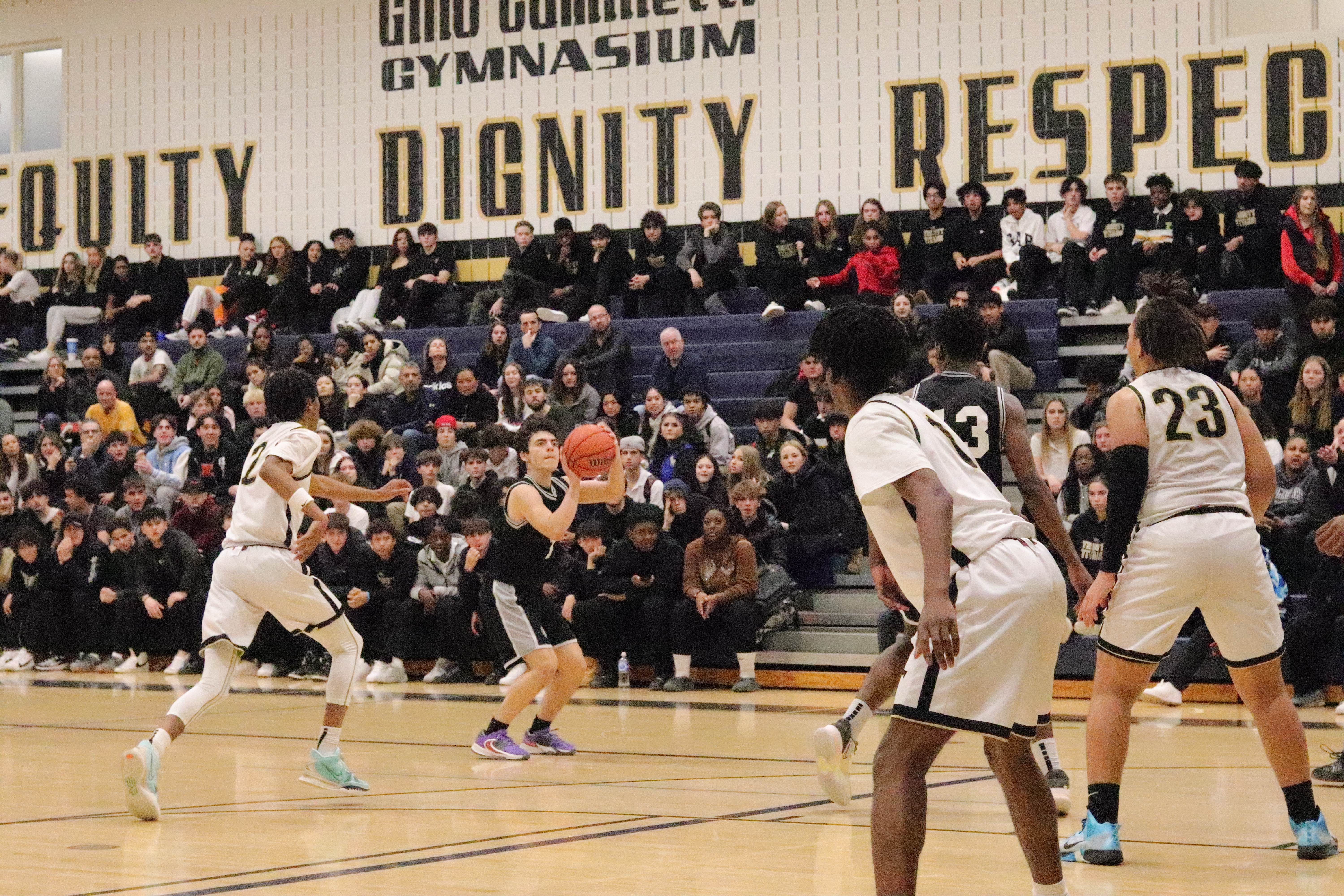 Aquinas fought hard | The Raiders were able to claw their way back to within 7 in the 3rd Quarter, but turnovers and careless fouls let them down in the end. | Pierce Lang