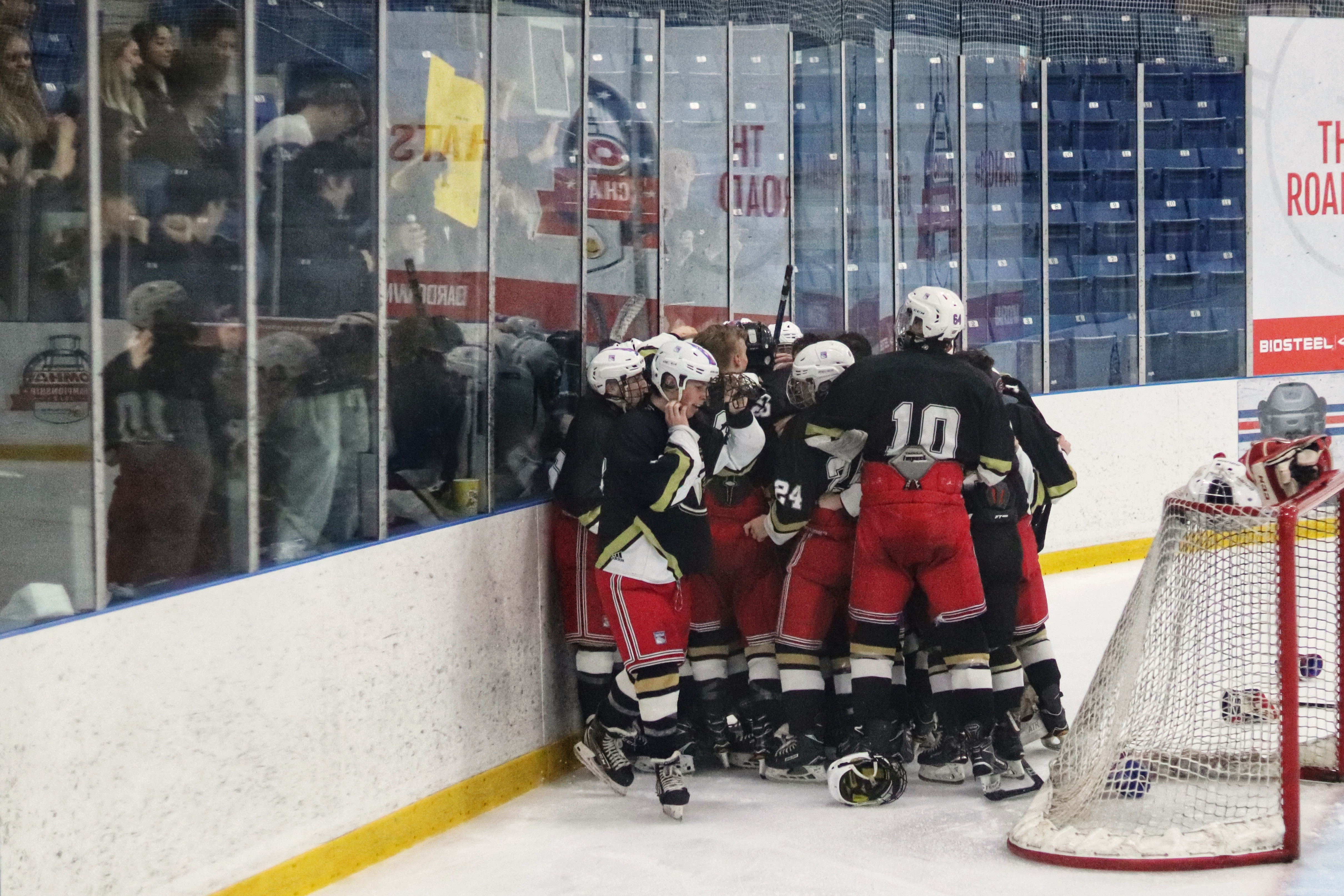 Champions! | Holy Trinity celebrates in front of their fans in the immediate aftermath of the exhilarating come-from-behind victory in the Halton Catholic Athletic Association Final. | Pierce Lang