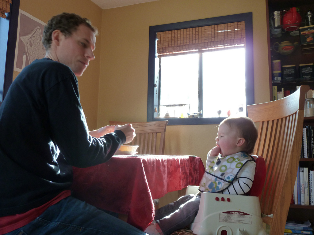 dad feed his infant breakfast | Chas Redmond  -  Foter  -  CC BY 2.0