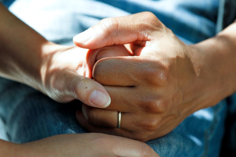 holding-hands-wedding-ring-national-cancer-institute-unsplash