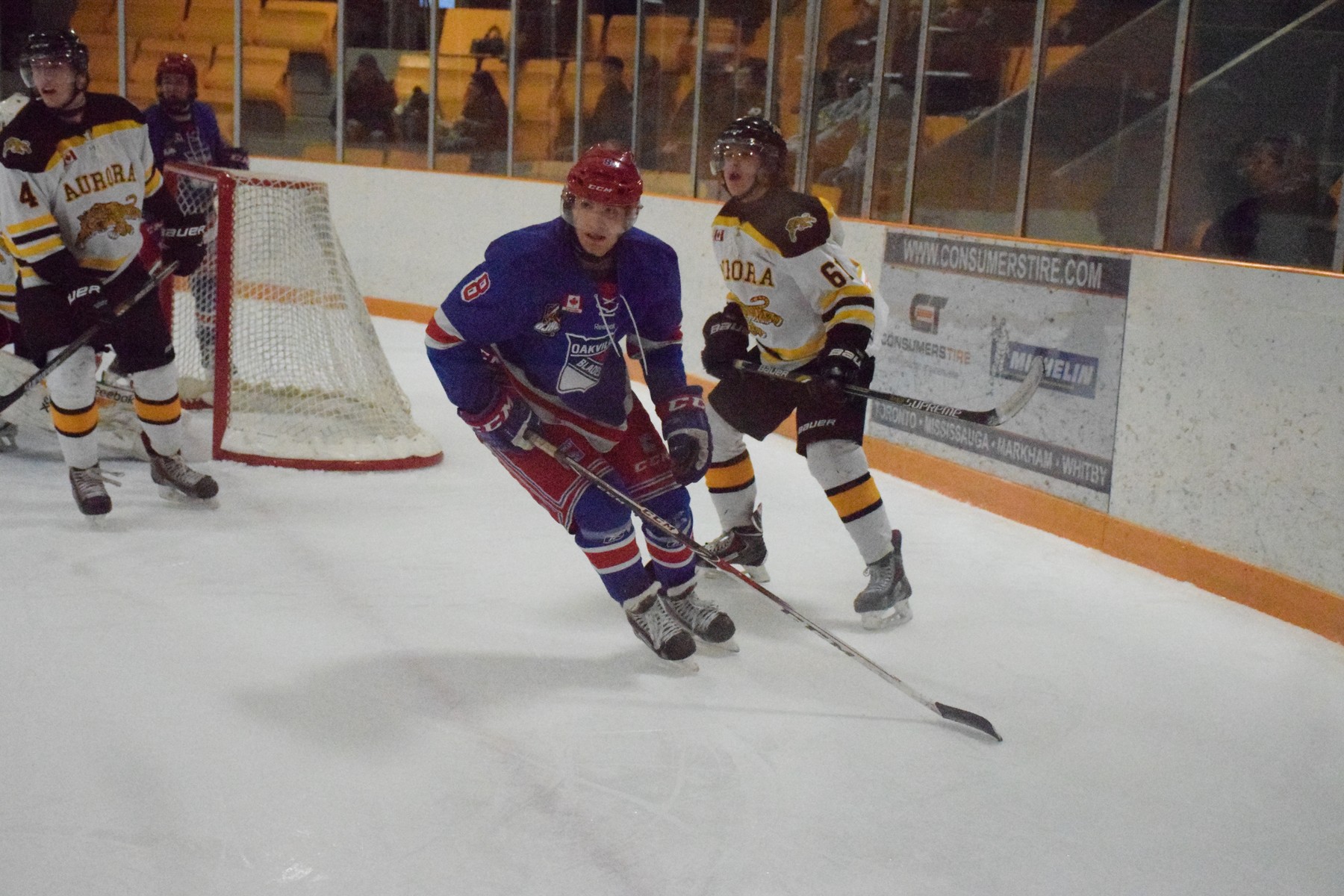Kamil Tkaczuk (8) escapes an opposing Aurora defenseman during the third period. | Scott Ellis - The Hockey House