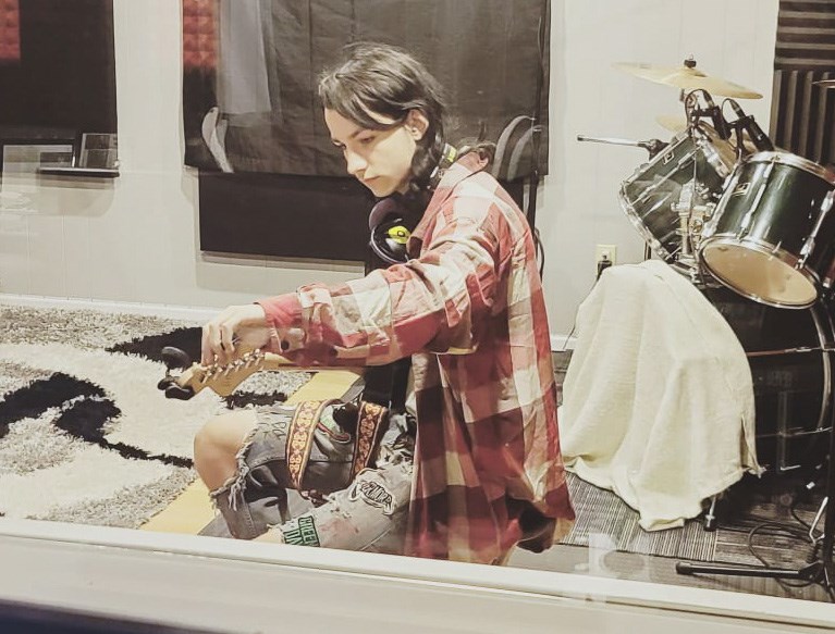 Multi-instrumental youth Dave Grunleitner works on his craft in a friend's studio on Feb. 14. Grunleitner has just released the single 'Evidently Degrading' on streaming platforms, and is hosting an Open Mic night at Hub Town Brewing on Feb. 17. (Photo submitted)